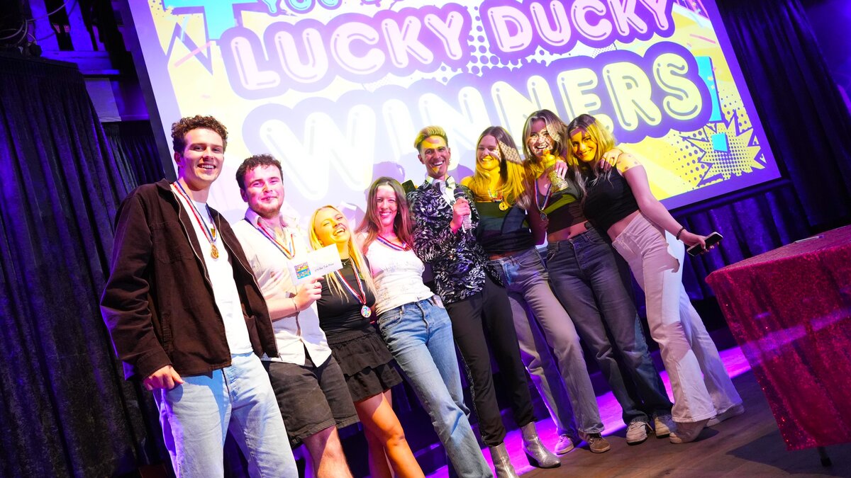 Lucky Ducky Game Show - presenter with microphone